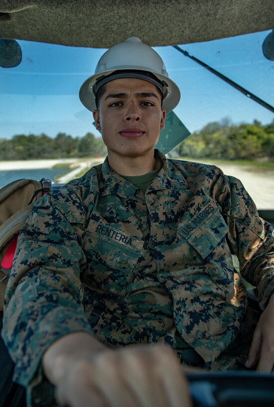 Lance Cpl. Ismael Renteria, a heavy equipment operator with Special Purpose Marine Air-Ground Task Force - Southern Command, operates a TRAM 624KR Tractor during a command post exercise at Camp Lejeune, North Carolina, April 6, 2020. The Marines and Sailors of SPMAGTF-SC use this training opportunity during CPX to show their capabilities in a controlled environment. SPMAGTF-SC will be deployed into the Southern Command area of operation to provide crisis response preparedness efforts, security cooperation training and engineering events to help strengthen relations with partner nations throughout Central and South America. Renteria is a native of Atwater, California. (U.S. Marine Corps photo by Sgt. Andy O. Martinez)