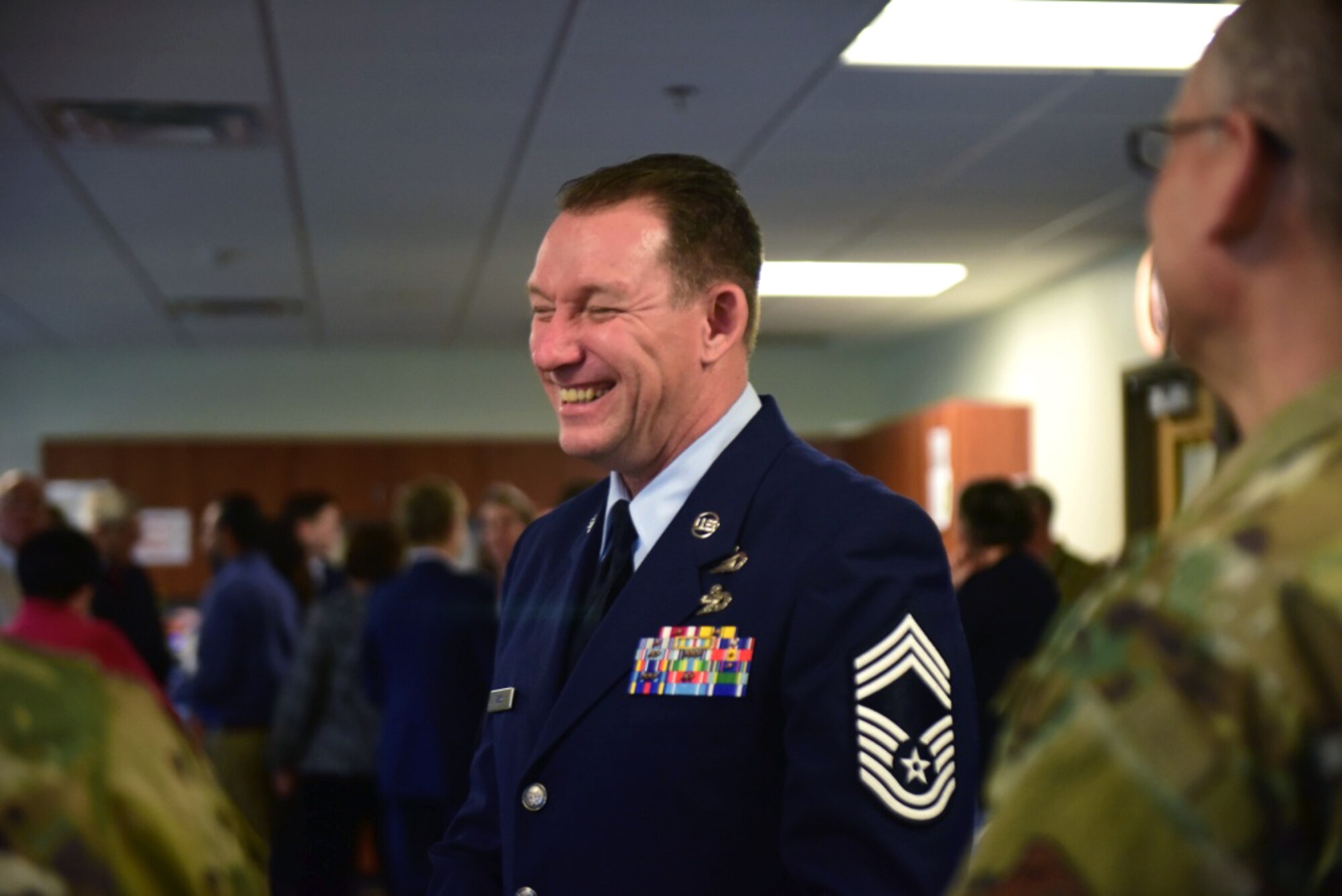 Chief Master Sgt. Scott E. Ross, the incoming 178th Wing Command Chief, greets guests for his Change of Authority ceremony, Jan. 12, 2020 at Springfield Air National Guard Base, Ohio. Ross replaces Chief Master Sgt. Heidi A. Bunker, the outgoing 178th Wing command chief. (U.S. Air National Guard photo by Staff Sgt. Rachel Simones)