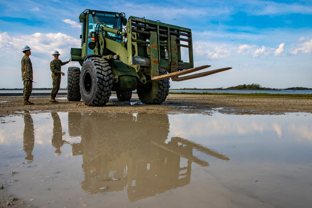 Marines with Special Purpose Marine Air-Ground Task Force - Southern Command operate a TRAM 724KR to move equipment during a command post exercise at Camp Lejeune, North Carolina, April 7, 2020. The CPX increases readiness and challenges SPMAGTF-SC command and control, communications and timely decision-making capabilities through simulated real-world scenarios. SPMAGTF-SC will be deployed into the Southern Command area of operation to provide crisis response preparedness efforts, security cooperation training and engineering events to help strengthen relations with partner nations throughout Central and South America. (U.S. Marine Corps photo by Sgt. Andy O. Martinez)