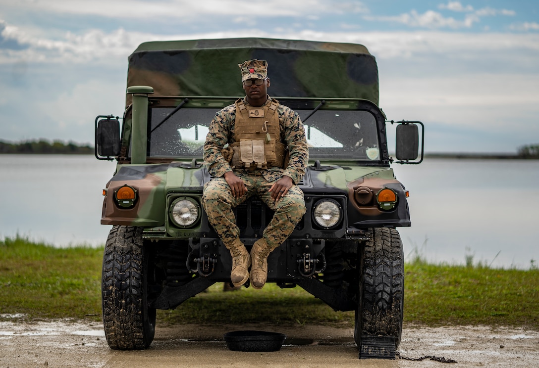 Lance Cpl. Anthony Brown, a landing support specialist with Special Purpose Marine Air-Ground Task Force - Southern Command, fills the billet as duty driver of the safety vehicle during a command post exercise at Camp Lejeune, North Carolina, April 9, 2020. The CPX increases readiness and challenges SPMAGTF-SC command and control, communications and timely decision-making capabilities through simulated real-world scenarios. SPMAGTF-SC will be deployed into the Southern Command area of operation to provide crisis response preparedness efforts, security cooperation training and engineering events to help strengthen relations with partner nations throughout Central and South America. Brown is a native of Sacramento, California. (U.S. Marine Corps photo by Sgt. Andy O. Martinez)