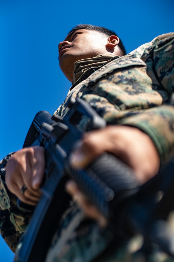 Lance Cpl. Laurenz Fredeluces, a landing support specialist with Special Purpose Marine Air-Ground Task Force - Southern Command, participates in military operations on urban terrain training during a general exercise at Camp Lejeune, North Carolina, April 17, 2020. MOUT training helps Marines develop small unit leadership and maintain operational readiness. The GENEX includes training events such as engineering projects and evacuation control center training scenarios that will help build the SPMAGTF-SC for their final certification exercise. These training events also provide the Marines and Sailors with real-world scenarios to prepare them for their deployment to assist partner nation militaries in Latin America and the Caribbean. Fredeluces is a native of Sacramento, California. (U.S. Marine Corps photo by Sgt. Andy O. Martinez)