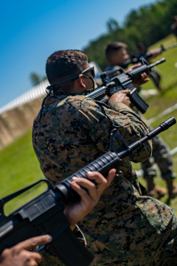 Marines with Special Purpose Marine Air-Ground Task Force - Southern Command participate in military operations on urban terrain training during a general exercise at Camp Lejeune, North Carolina, April 17, 2020. MOUT training helps Marines develop small unit leadership and maintain operational readiness. The GENEX includes training events such as engineering projects and evacuation control center training scenarios that will help build the SPMAGTF-SC for their final certification exercise. These training events also provide the Marines and Sailors with real-world scenarios to prepare them for their deployment to assist partner nation militaries in Latin America and the Caribbean. (U.S. Marine Corps photo by Sgt. Andy O. Martinez)