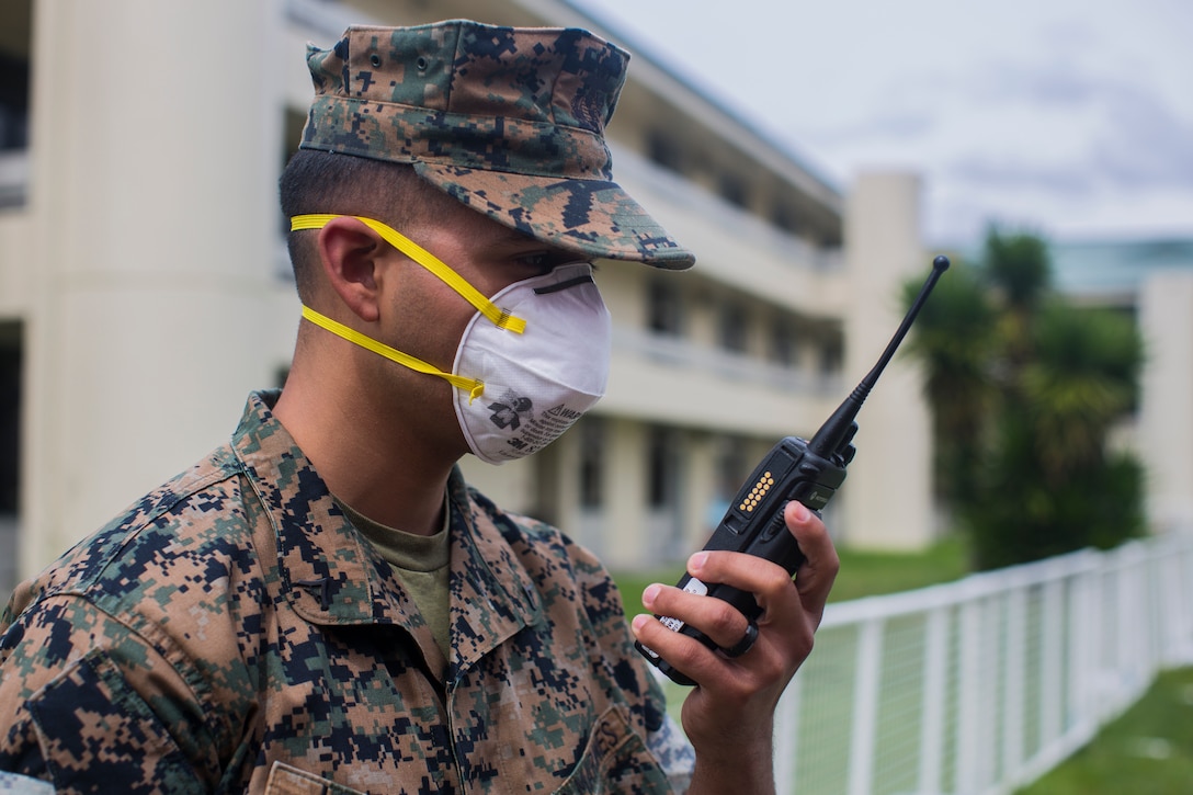 U.S. Marines with Marine Wing Headquarters Squadron 3, 3rd Marine Aircraft Wing, enforce precautionary measures such as cleaning and disinfecting the barracks during field day on Marine Corps Air Station Miramar, Calif., March 23.