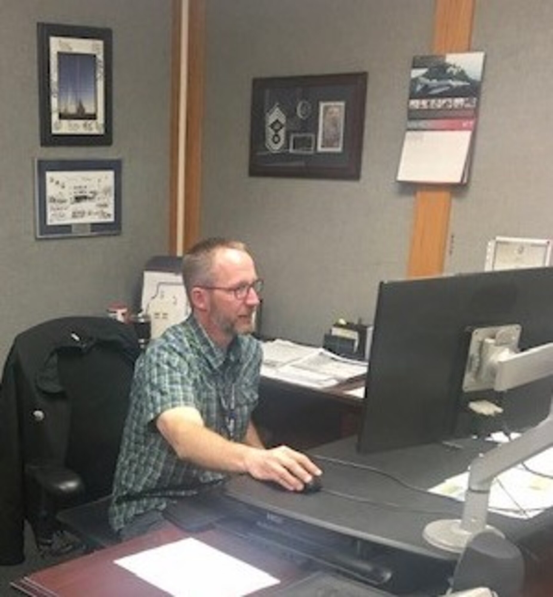 Michael Holmquist, 673LRS materiel management flight chief, performs administrative duties at Joint Base Elmendorf-Richardson, Alaska,  May 15, 2020.