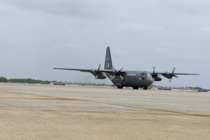 A Pakistan air force C-130 aircraft arrives at Joint Base Andrews, Md., May 21, 2020. The aircraft brought 100,000 protective masks and 25,000 coveralls for the Federal Emergency Management Agency in response to COVID-19. (U.S. Air Force photo by Airman 1st Class Spencer Slocum)