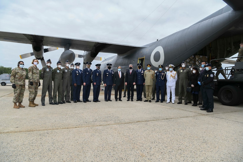U.S and Pakistani leadership pose for a photo in front of a Pakistan air force C-130 at Joint Base Andrews, Md., May 21, 2020. Ambassador Asad Majeed Khan, an official from the Pakistani Embassy, noted the armed forces of both countries have fought together in the Global War on Terrorism and stand together in the fight against the COVID-19 pandemic. (U.S. Air Force photo by Airman 1st Class Spencer Slocum)