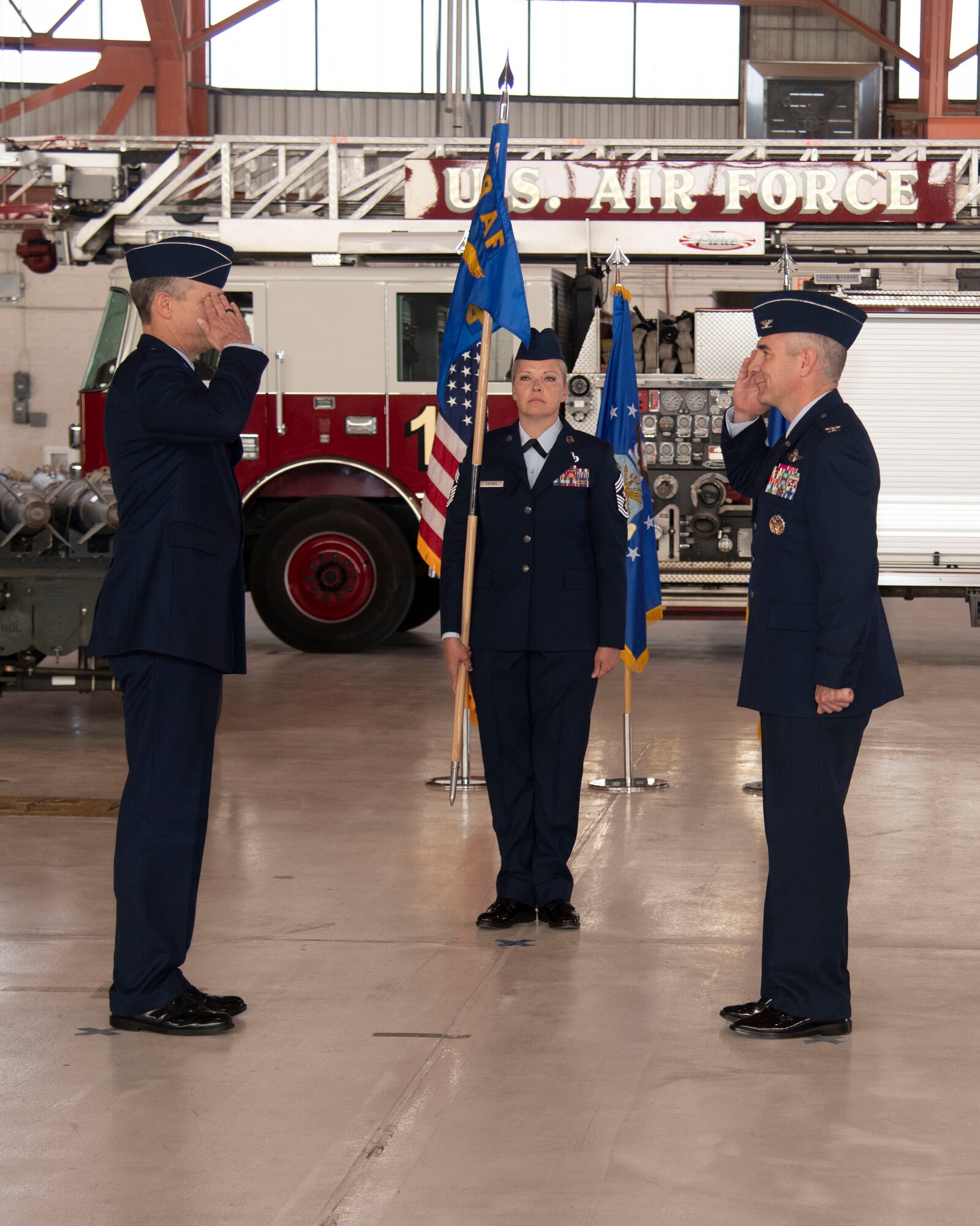 Col. Joseph Campo (right), outgoing 49th Wing commander, relinquishes command to Maj. Gen. Craig Wills (left), 19th Air Force commander, during the 49th WG Change of Command ceremony, May 21, 2020, on Holloman Air Force Base, N.M. Col. Ryan Keeney assumed command of the 49th WG during a formal ceremony. (U.S. Air Force photo Tech. Sgt. BreeAnn Sachs)