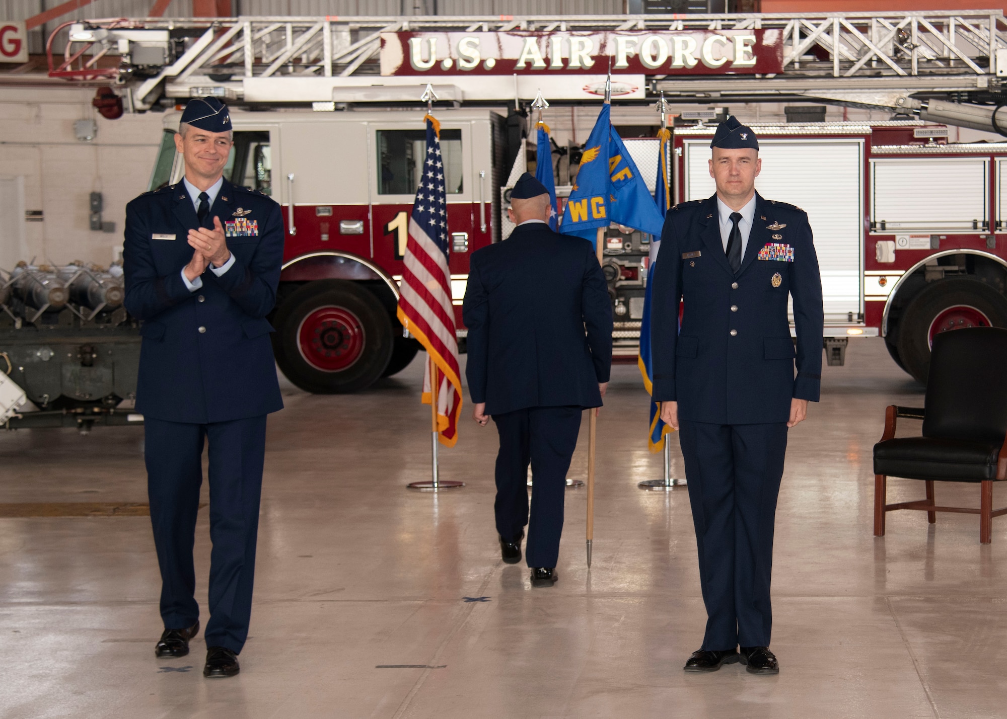 Col. Ryan Keeney, 49th Wing commander, stands at attention after assuming command of the 49th Wing, May 21, 2020, on Holloman Air Force Base, N.M. Holloman is the premiere training base for F-16 Fighting Falcon and MQ-9 Reaper pilots and sensor operators. (U.S. Air Force photo by Tech. Sgt. BreeAnn Sachs)