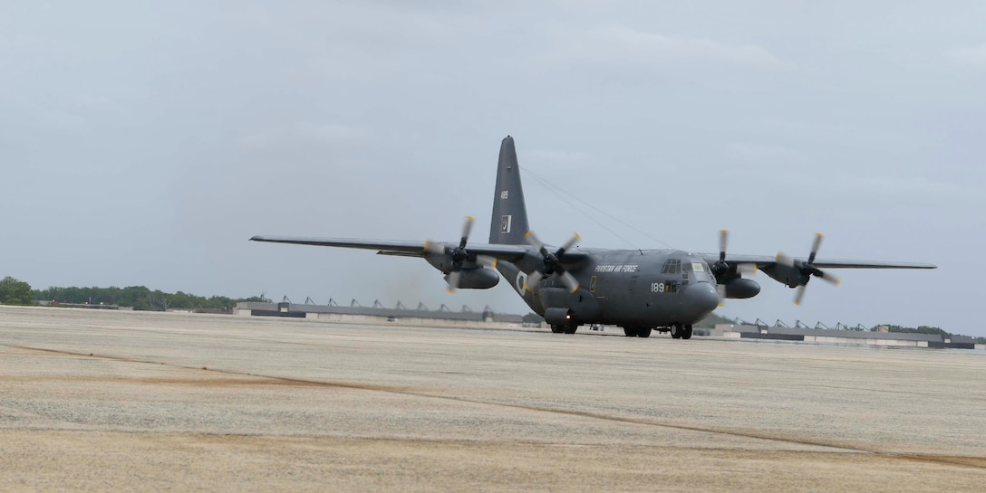 A Pakistan air force C-130 aircraft arrives at Joint Base Andrews, Md., May 21, 2020. The aircraft brought 100,000 protective masks and 25,000 coveralls for the Federal Emergency Management Agency in response to COVID-19. (U.S. Air Force photo by Airman 1st Class Spencer Slocum)