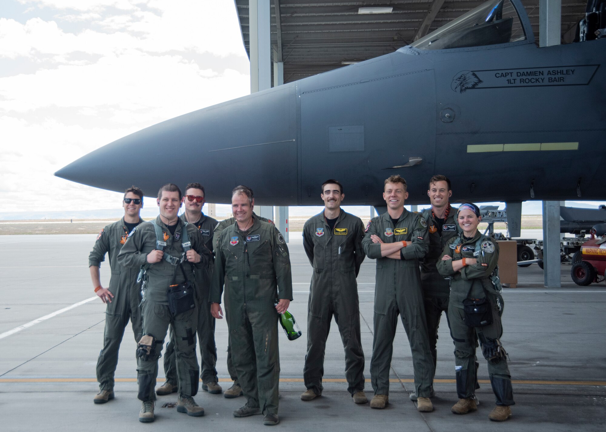 U.S. Air Force Lt. Col. Aaron C. “Badger” Lapp, 366th Fighter Wing director of operations and plans, poses with his fellow pilots, May 15, 2020, on Mountain Home Air Force Base, Idaho. During his time in service, Lapp has flown five different types of aircraft such as the T-38 Talon, T-37 Tweet, F-15E Strike Eagle, F-15SG Strike Eagle and F/A-18 Super Hornet. (U.S. Air Force photo by Airman 1st Class Akeem K. Campbell)