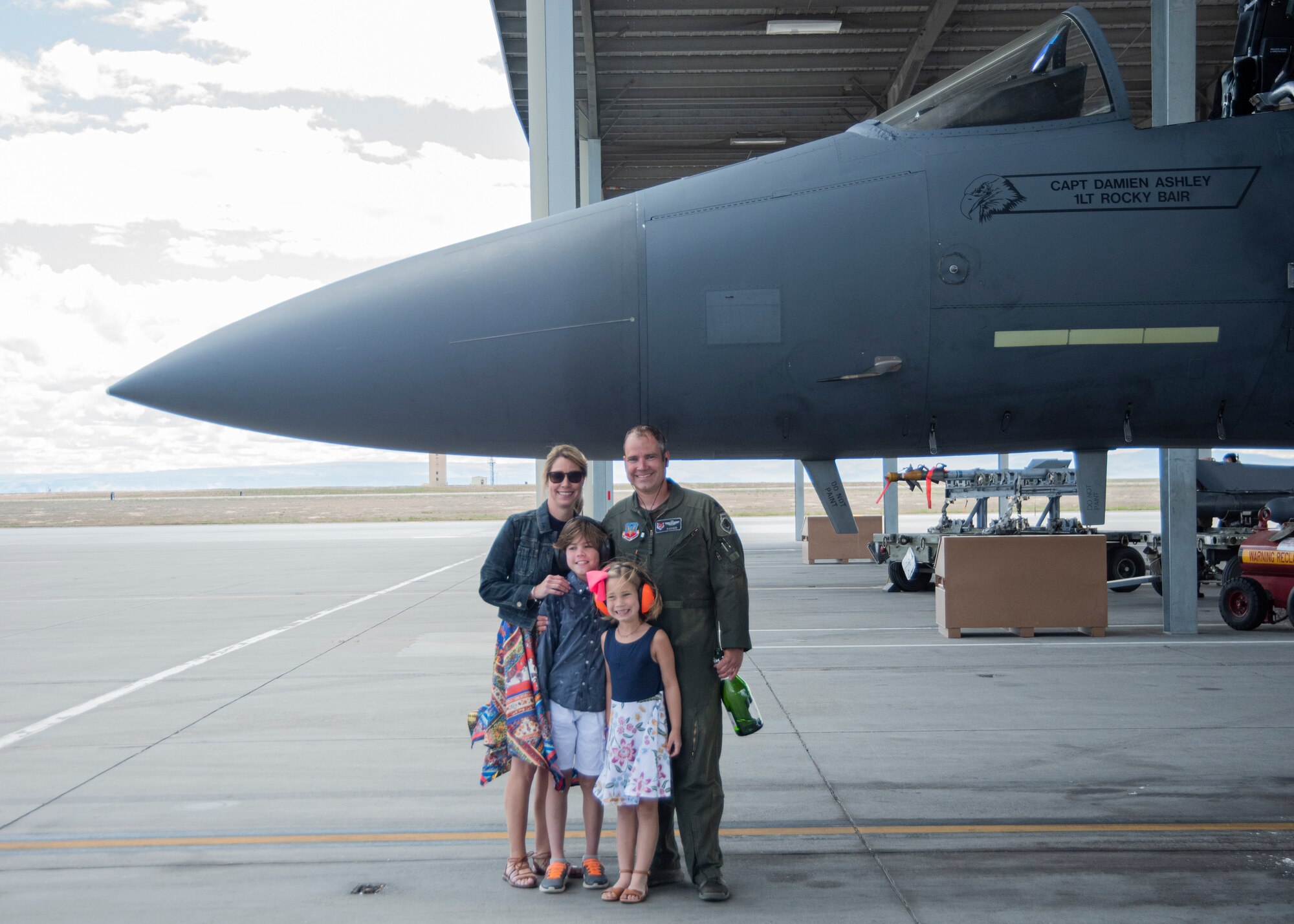 U.S. Air Force Lt. Col. Aaron C. “Badger” Lapp, 366th Fighter Wing director of operations and Plans, poses with his family, May 15, 2020, on Mountain Home Air Force Base, Idaho. During his time in service, Lapp was selected to be an exchange pilot of the Royal Australian air force at RAAF Williamtown, Australia, where he flew the F/A-18 Super Hornet. (U.S. Air Force photo by Airman 1st Class Akeem K. Campbell)