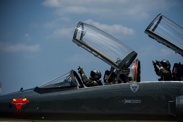 Capt. Mark Palyok, 87th Flying Training Squadron assistant flight commander, inspects a T-38C Talon as preparation to depart from Laughlin Air Force Base, Texas, to fly in a dissimilar formation of aircraft--one over Del Rio and Eagle Pass and the other over San Angelo--on May 21, 2020. The flyover consisted of the T-6A Texan II, T-1A Jayhawk and the T-38 and honored the men and women on the front lines of the fight against COVID-19 during the Defense Department’s #AmericaStrong salute. (U.S. Air Force photo by Senior Airman Anne McCready)