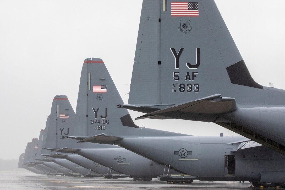 Nine C-130J Super Hercules assigned to the 36th Airlift Squadron wait on the flightline during the Samurai Surge training exercise at Yokota Air Base, Japan, May 21, 2020.