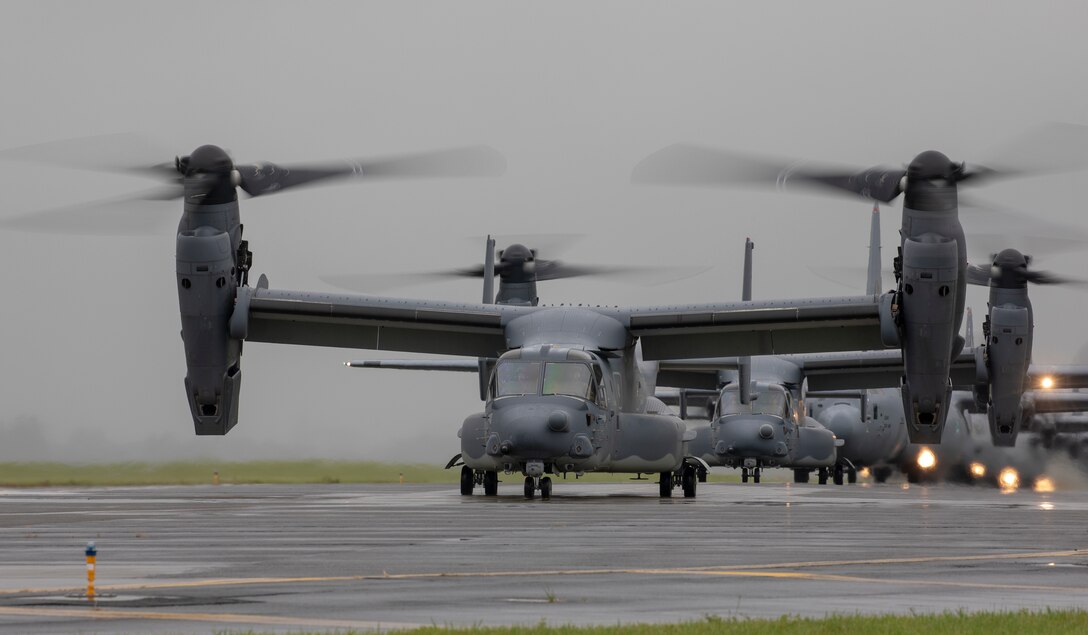 CV-22 Ospreys assigned to the 21st Special Operations Squadron taxi on the runway at Yokota Air Base, Japan, May 21, 2020, during the Samura Surge training exercise.