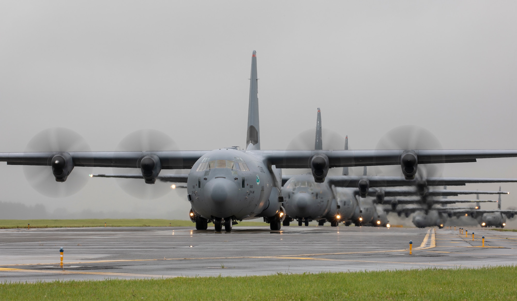 Seven C-130J Super Hercules' assigned to the 36th Airlift Squadron taxi on the runway at Yokota Air Base, Japan, May 21, 2020, during the Samurai Surge training exercise