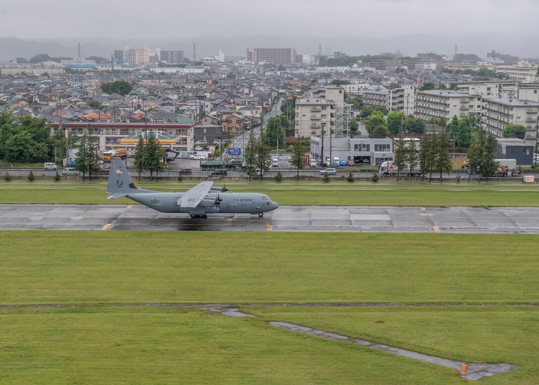 A C-130J Super Hercules, assigned to the 36th Airlift Squadron, taxis across the Yokota Air Base, Japan, flightline during the elephant walk portion of the Samurai Surge training exercise, May 21, 2020.