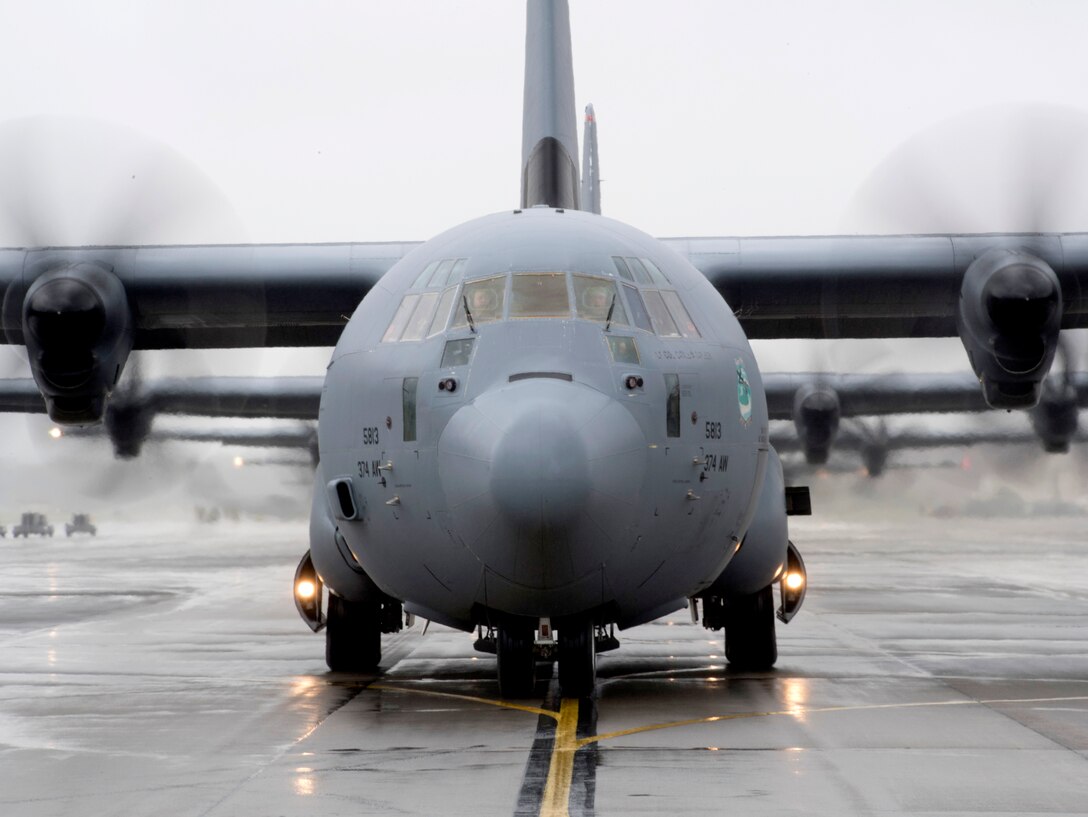A C-130J Super Hercules, assigned to the 36th Airlift Squadron, taxis across the Yokota Air Base, Japan, flightline during the elephant walk portion of the Samurai Surge training exercise, May 21, 2020.