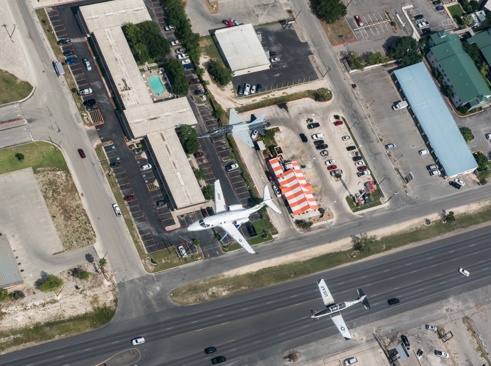 T-6 Texan II, T-1A Jayhawk and a T-38C Talon, assigned to Laughlin Air Force Base, Texas, perform a flyover in Del Rio, Texas, May 21, 2020. Laughlin performed flyovers in three Texas cities as a part of the America Strong America Salutes Campaign, to show its gratitude for all front-line responders, economy sustainers and community members in the COVID-19 pandemic. (U.S. Air Force photo by Master Sgt. JT May III)