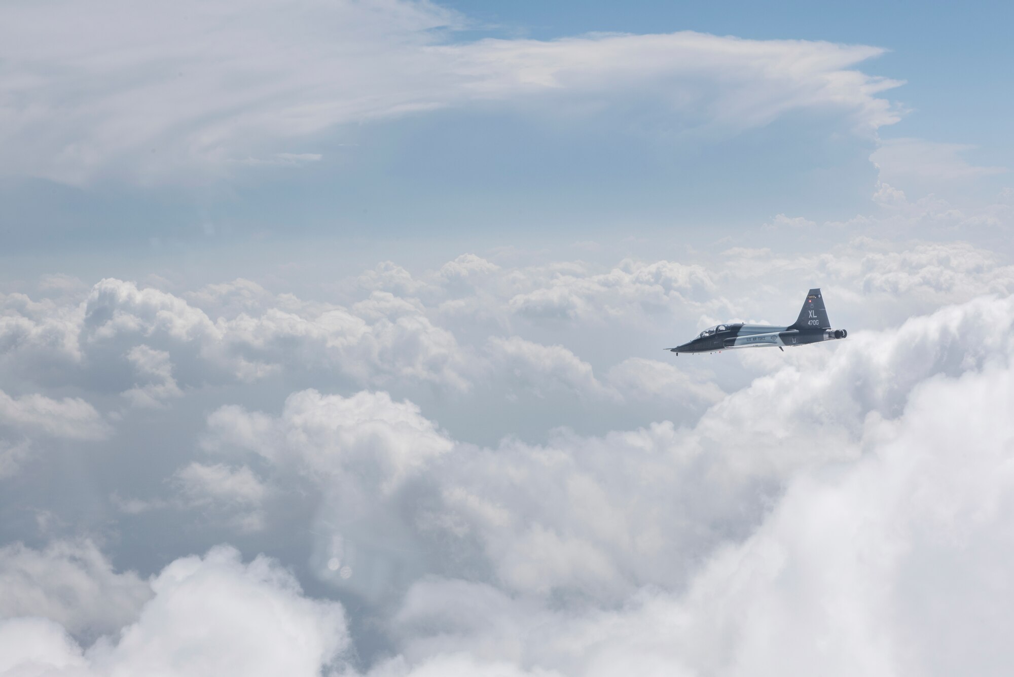 A T-6 Texan II, T-1A Jayhawk and a T-38C Talon, assigned to Laughlin Air Force Base, Texas, perform a flyover in San Angelo, Texas, May 21, 2020. Laughlin performed flyovers in three Texas cities as a part of the America Strong America Salutes Campaign, to show its gratitude for all front-line responders, economy sustainers and community members in the COVID-19 pandemic. (U.S. Air Force photo by Staff Sgt. Benjamin N. Valmoja)