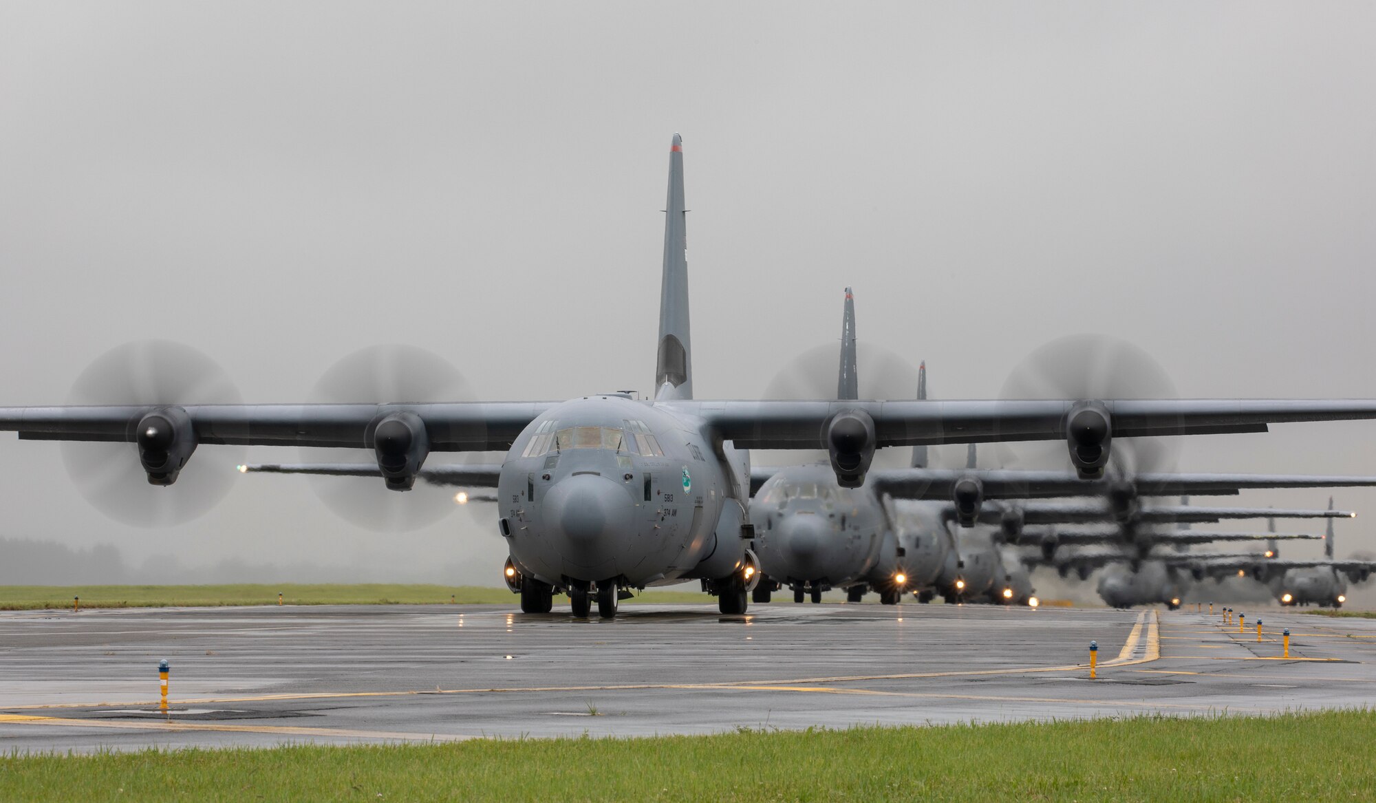Seven C-130J Super Hercules' assigned to the 36th Airlift Squadron taxi on the runway at Yokota Air Base, Japan, May 21, 2020, during the Samurai Surge training exercise