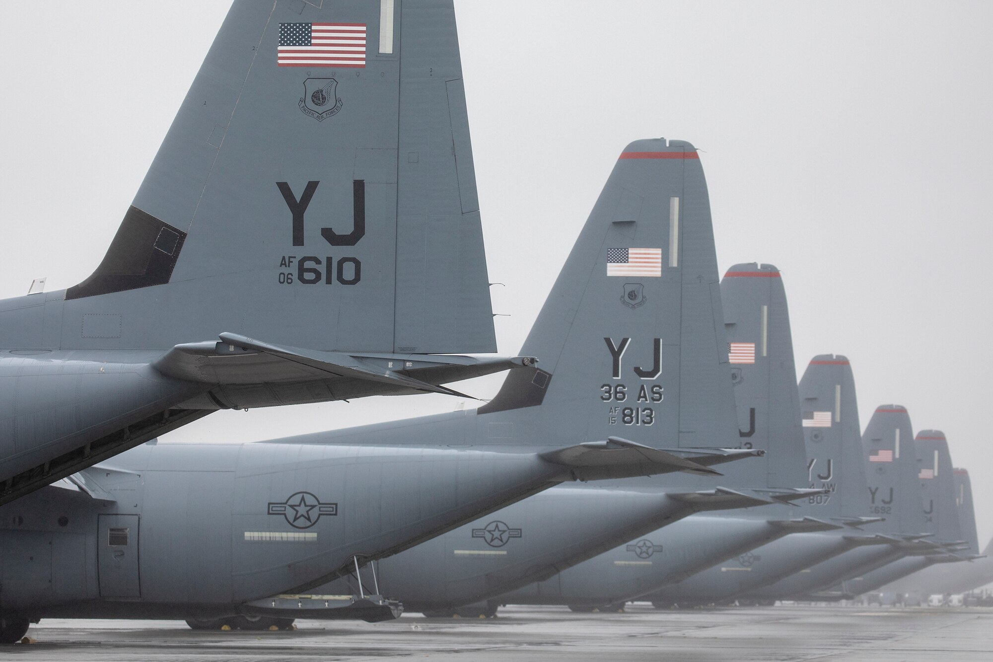 Seven C-130J Super Hercules assigned to the 36th Airlift Squadron wait on the flightline during the Samurai Surge training exercise at Yokota Air Base, Japan, May 21, 2020.