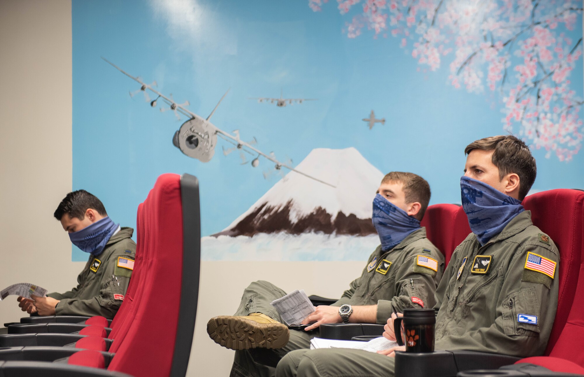 Aircrews conduct a physically distant pre-flight briefing before stepping out to their aircraft as part of the 374th Airlift Wing’s Samurai Surge training exercise.
