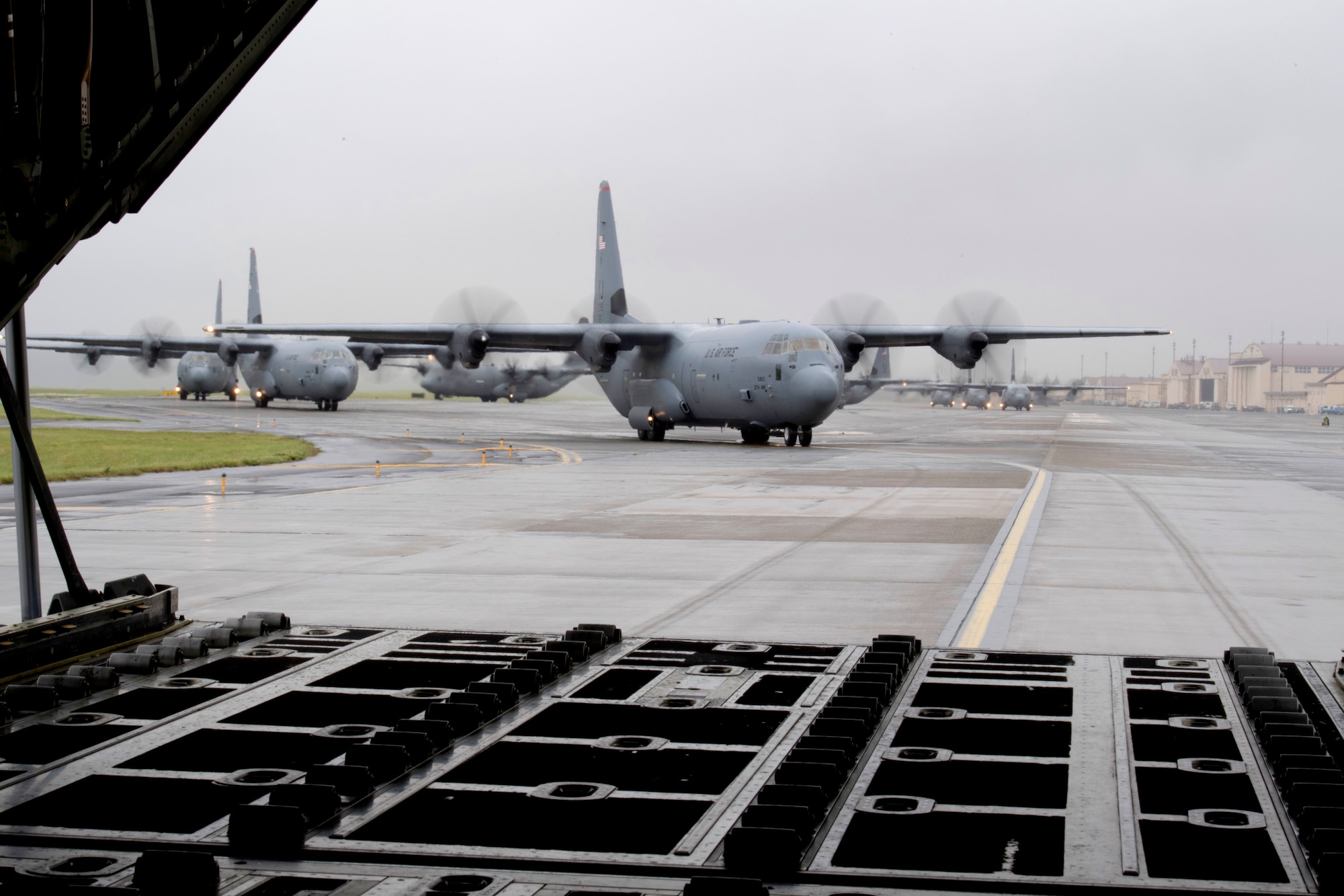 A C-130J Super Hercules, assigned to the 36th Airlift Squadron, taxis across the Yokota Air Base, Japan, flightline during the elephant walk portion of the Samurai Surge training exercise, May 21, 2020.
