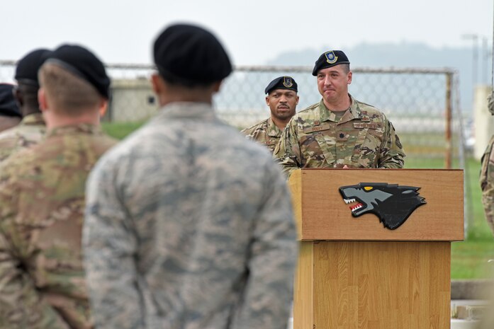 U.S. Air Force Lt. Col. Jacob Foley, 8th Security Forces Squadron commander, speaks to Wolf Pack Defenders during National Police Week at Kunsan Air Base, Republic of Korea, May 18, 2020. The 8th SFS hosted a myriad of activities to pay tribute to the fallen and raise awareness about the National Law Enforcement Officers Memorial Fund, including a golf tournament, law enforcement display, memorial run and relay challenge. (U.S. Air Force photo by Staff Sgt. Mackenzie Mendez)