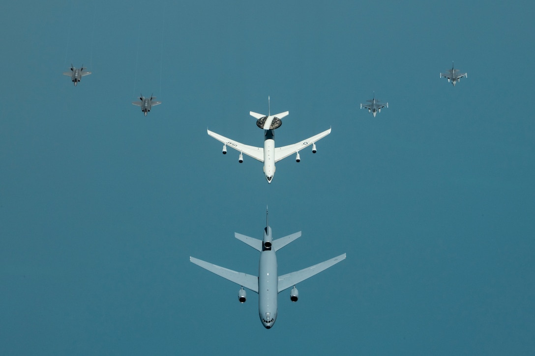 Aircraft with the 380th Air Expeditionary Wing fly in formation