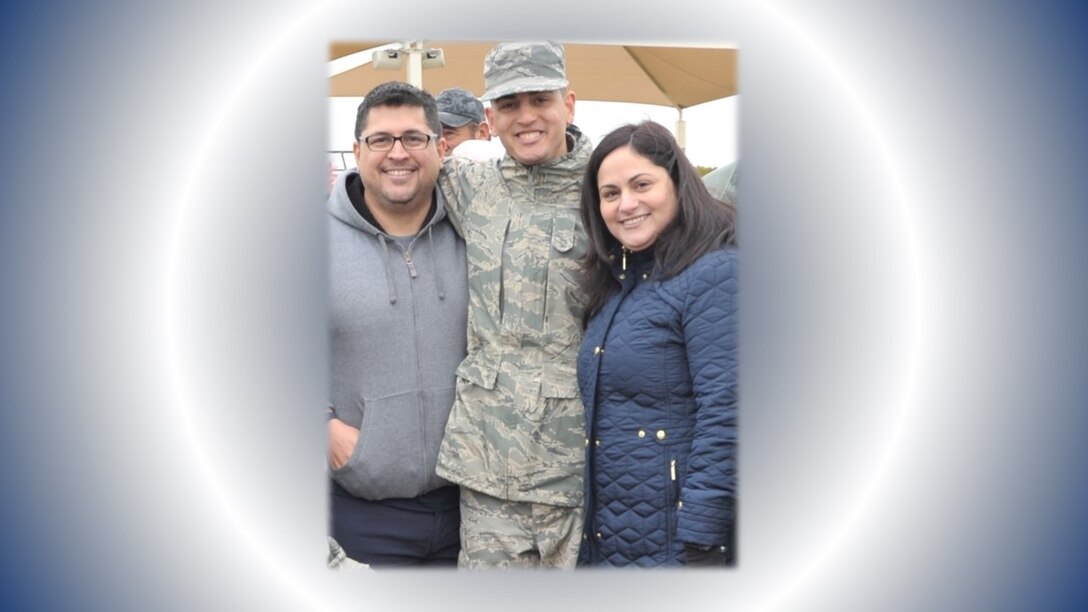 Airman Basic Kevin Rios Rivera and his parents pose for a post-graduation photo following his Nov. 8, 2019 graduation from basic military training at Joint Base San Antonio-Lackland, Texas. Airman Rios Rivera is now a career development technician in the 340th FTG Military Personnel section. As the May On the Spot Award winner, he'll be able to park in the group commander's parking space for a week, once members are able to return to work on base. (U.S. Air Force photo by Debbie Gildea)