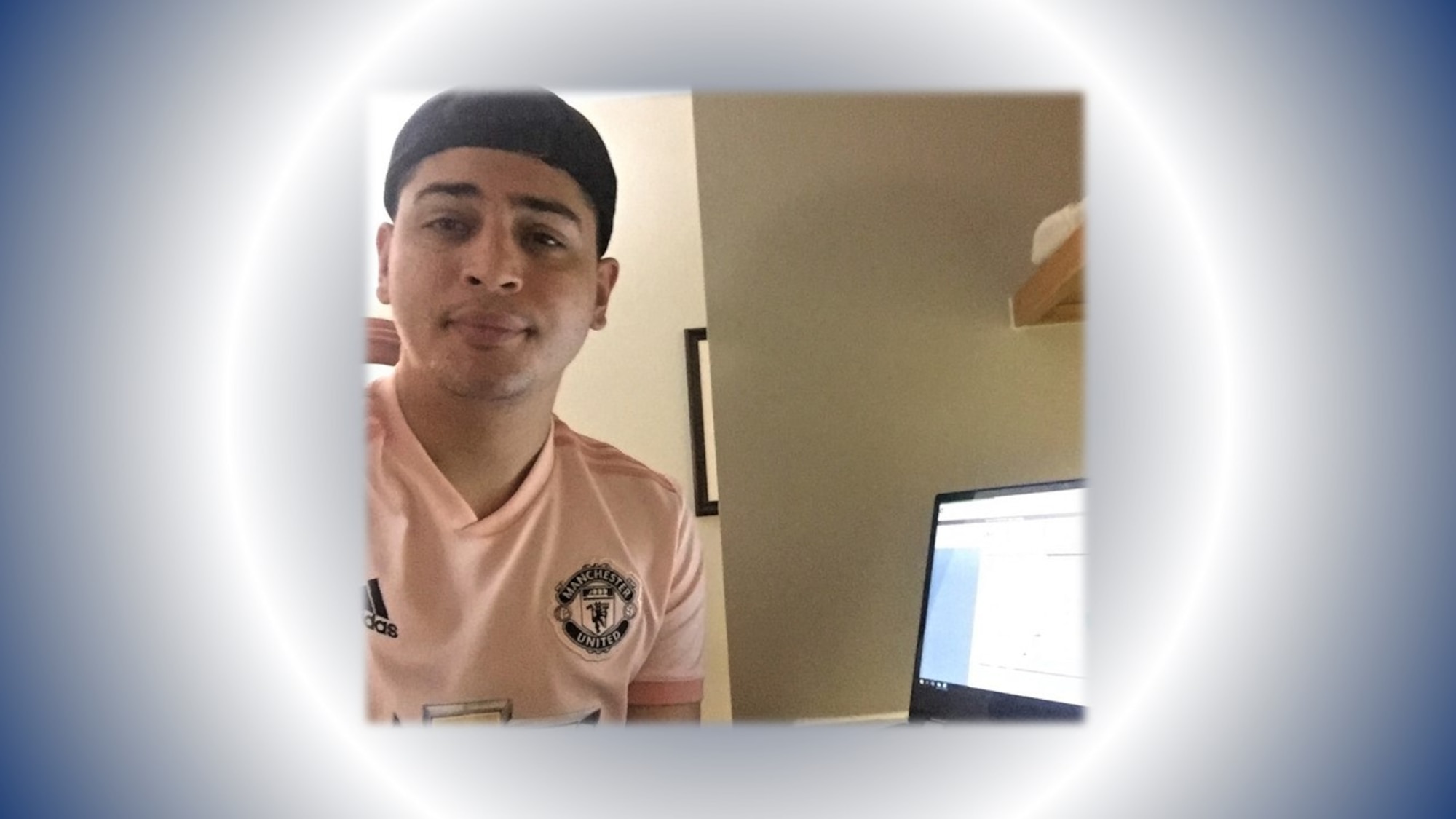 Airman Kevin Rios Rivera takes a break from processing evaluations and decorations in his home office. As the May On the Spot Award winner, he'll be able to park in the group commander's parking space for a week, once members are able to return to work on base. (U.S. Air Force photo)
