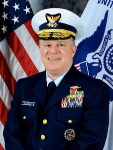 A portrait photograph of Vice Admiral Fred Midgette