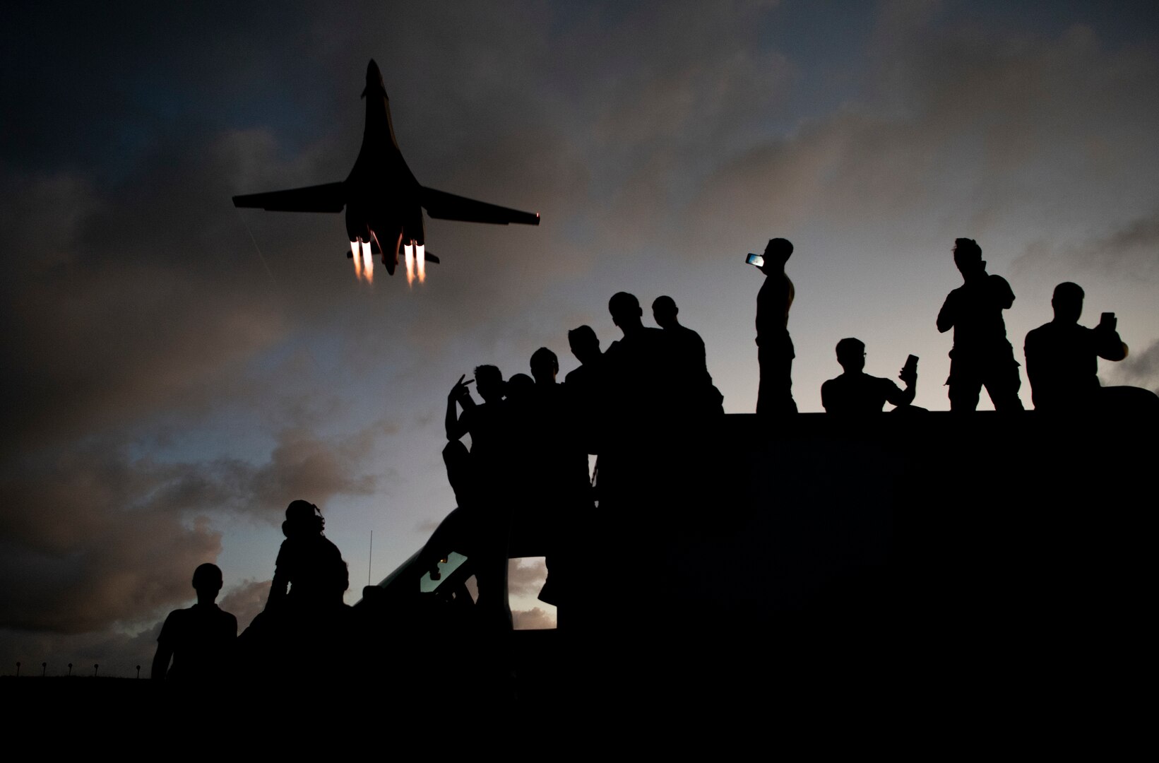 9th Expeditionary Bomb Squadron B-1B Lancer mechanics take selfies as a B-1B flies overhead at Andersen Air Force Base, Guam, May 21, 2020. In continued demonstration of the U.S. Air Force’s dynamic force employment model, two U.S. Air Force B-1B Lancers flew from Andersen AFB and conducted training in Alaska and near Misawa Air Base, Japan.

The 9th EBS deployed to Guam from Dyess Air Force Base, Texas, along with 200 Airmen assigned to the 7th Bomb Wing at Dyess AFB, Texas, as part of a Bomber Task Force and is supporting Pacific Air Forces’ strategic deterrence missions and commitment to the security and stability of the Indo-Pacific region. (U.S. Air Force photo by Senior Airman River Bruce)