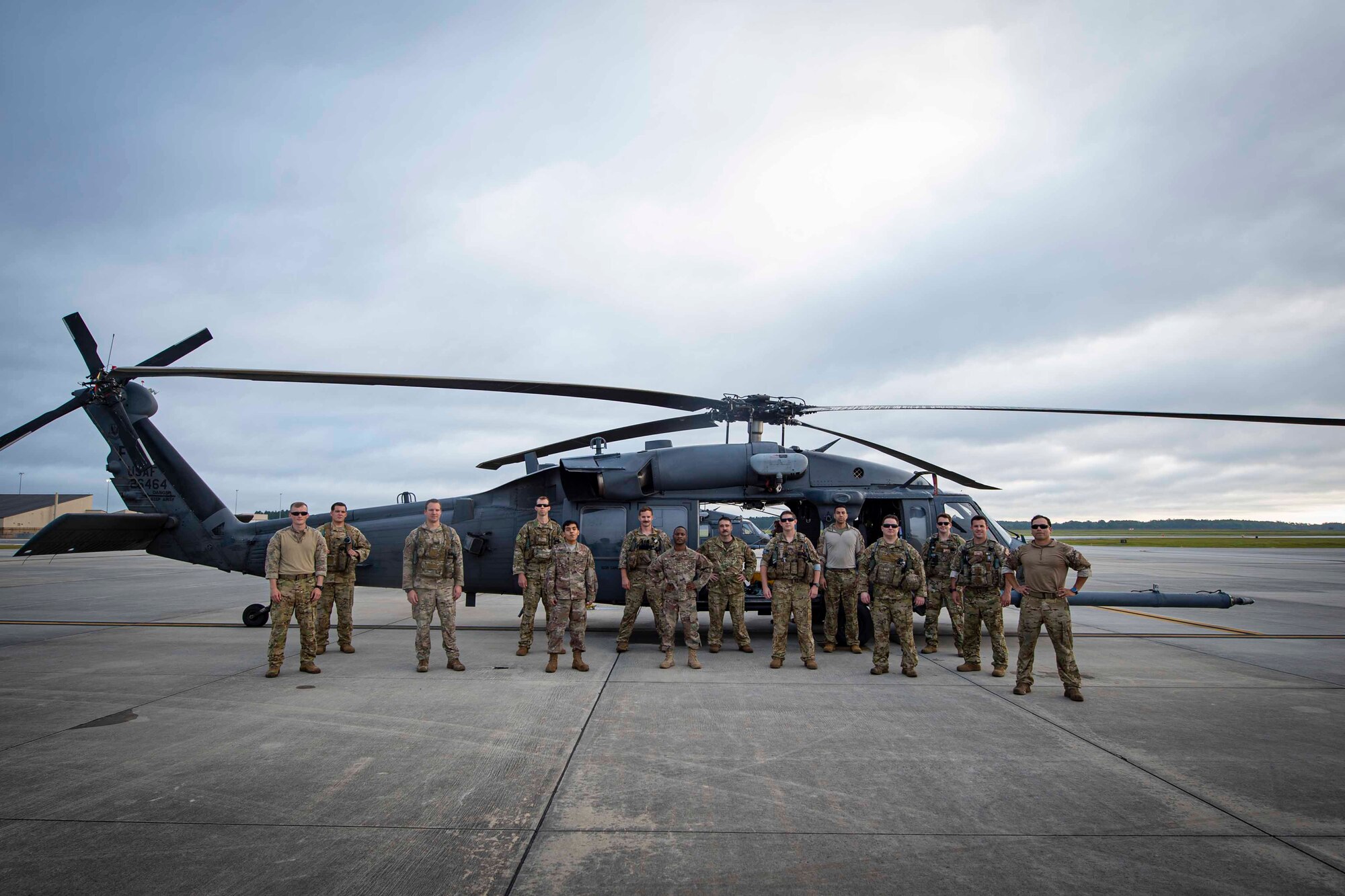 Photo of Airmen assigned to the 41st Rescue Squadron posing for a photo.