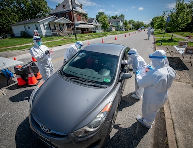 Members of the West Virginia National Guard’s Task Force Chemical, Biological, Radiological and Nuclear (CBRN) Response Enterprise (CRE) (TF-CRE) assist members of the Cabell Huntington Health Department to conduct COVID-19 public testing at the 16th Street Baptist Church in Huntington, West Virginia, May 22, 2020. The joint operation also involved members of Valley Health Systems, Mountain Health Network, Huntington Black Pastors Association, Cabell County EMS, Huntington Police Department, and Cabell County Emergency Management in a whole-of-government effort to provide free testing to the general public in order to combat the ongoing pandemic.