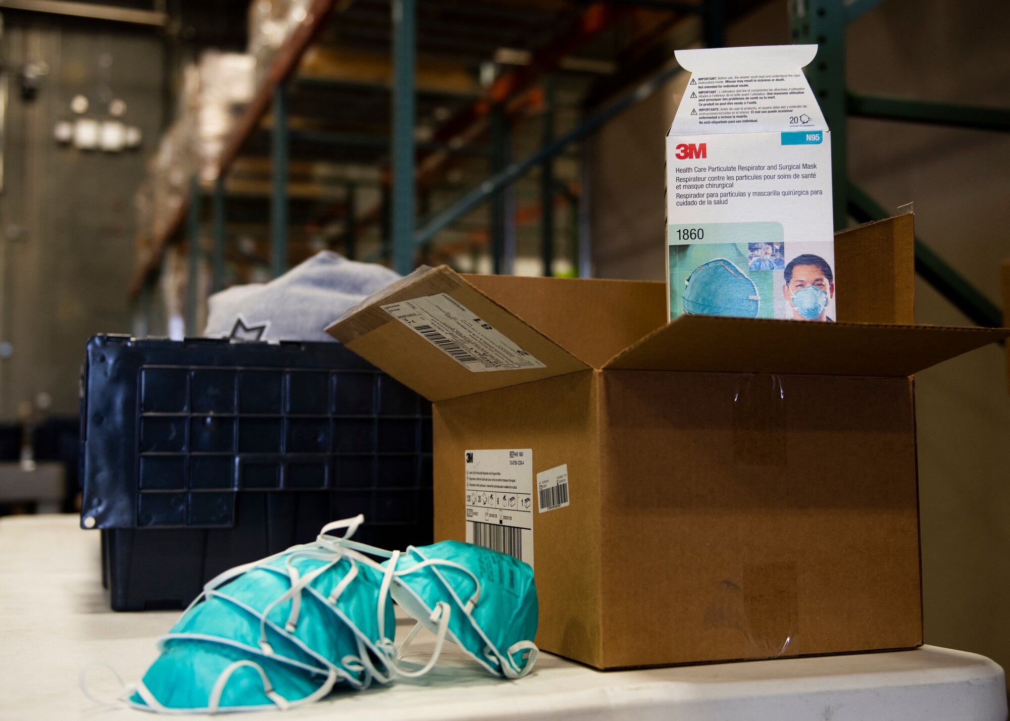 A box of medical masks sits on a table in the medical logistics warehouse, May 19, 2020, at Mountain Home Air Force Base, Idaho. The medical logistics team was able to gather supplies in preparation for COVID-19 in less than a week. (U.S. Air Force photo by Airman 1st Class Natalie Rubenak)
