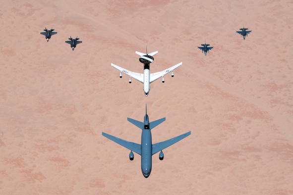 Aircraft with the 380th Air Expeditionary Wing fly in formation