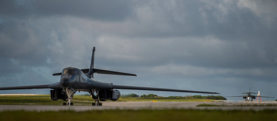 Two 9th Expeditionary Bomb Squadron B-1B Lancers taxi after landing at Andersen Air Force Base, Guam, May 22, 2020. These B-1B aircrews just completed a 24-hour mission that included a large force exercise. The 9th EBS is deployed to Andersen Air Force Base, Guam, as part of a Bomber Task Force supporting Pacific Air Forces’ strategic deterrence missions and  commitment to the security and stability of the Indo-Pacific region. (U.S. Air Force photo by Senior Airman River Bruce)