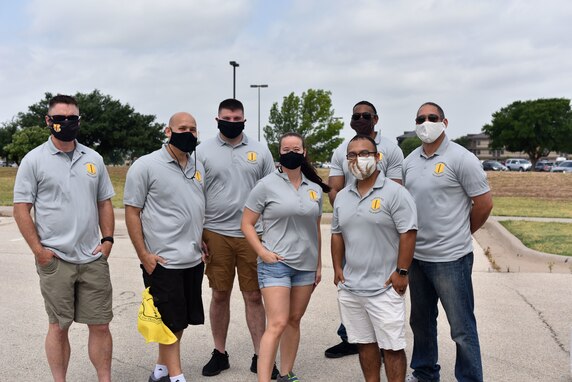 The Goodfellow First Sergeant Council poses for a group photo before the Memorial Day BBQ at the Crossroads on Goodfellow Air Force Base, Texas, May 23, 2020. The first sergeants took time from their Saturday to cook and visit with students on base. (U.S. Air Force photo by Senior Airman Seraiah Wolf)