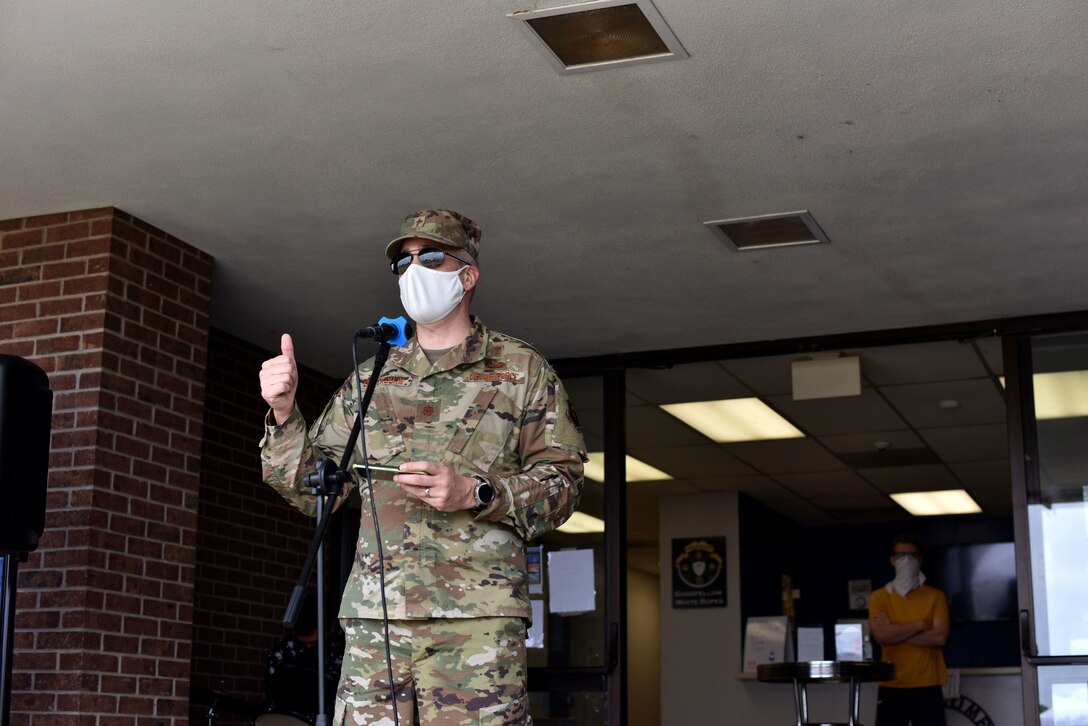 U.S. Air Force Capt. Jeremiah Blackburn, Goodfellow chaplain, delivers a small reminder about what Memorial Day is about during the BBQ at the Crossroads on Goodfellow Air Force Base, Texas, May 23, 2020. The chaplain reminded students that Memorial Day is to remember those who gave the ultimate sacrifice before saying a word of prayer. (U.S. Air Force photo by Senior Airman Seraiah Wolf)