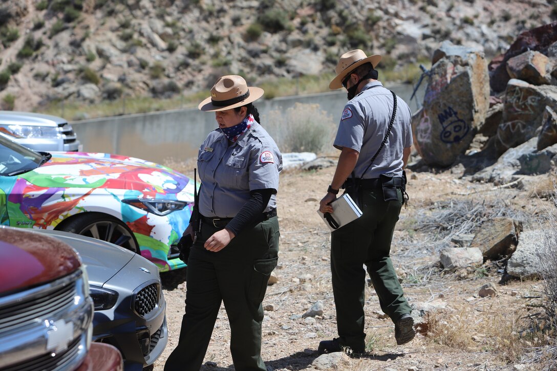 U.S. Army Corps of Engineers Los Angeles District Park Rangers Nick Figueroa and Mary Carmona issue parking citations May 17.