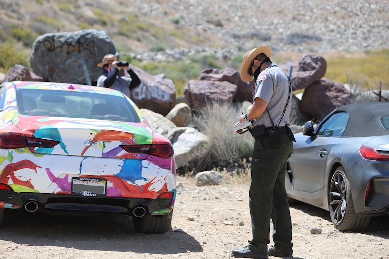 U.S. Army Corps of Engineers Los Angeles District Park Rangers Nick Figueroa and Mary Carmona issue parking citations May 17.