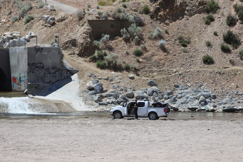 Unauthorized vehicle at the Corps Mojave River Dam's outlet May 17.