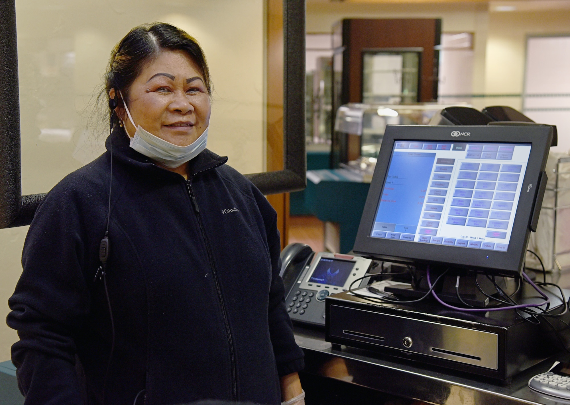Angie Gronlund serves as a cashier at the Vanwey Dining Facility.