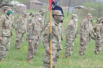 U.S. Soldiers with Headquarters and Headquarters Company, 28th Expeditionary Combat Aviation Brigade, stand in formation while adhering to social distancing guidelines and COVID-19 mitigation directives. The Pennsylvania National Guard Soldiers completed pre-deployment training despite obstacles presented by the COVID-19 pandemic.