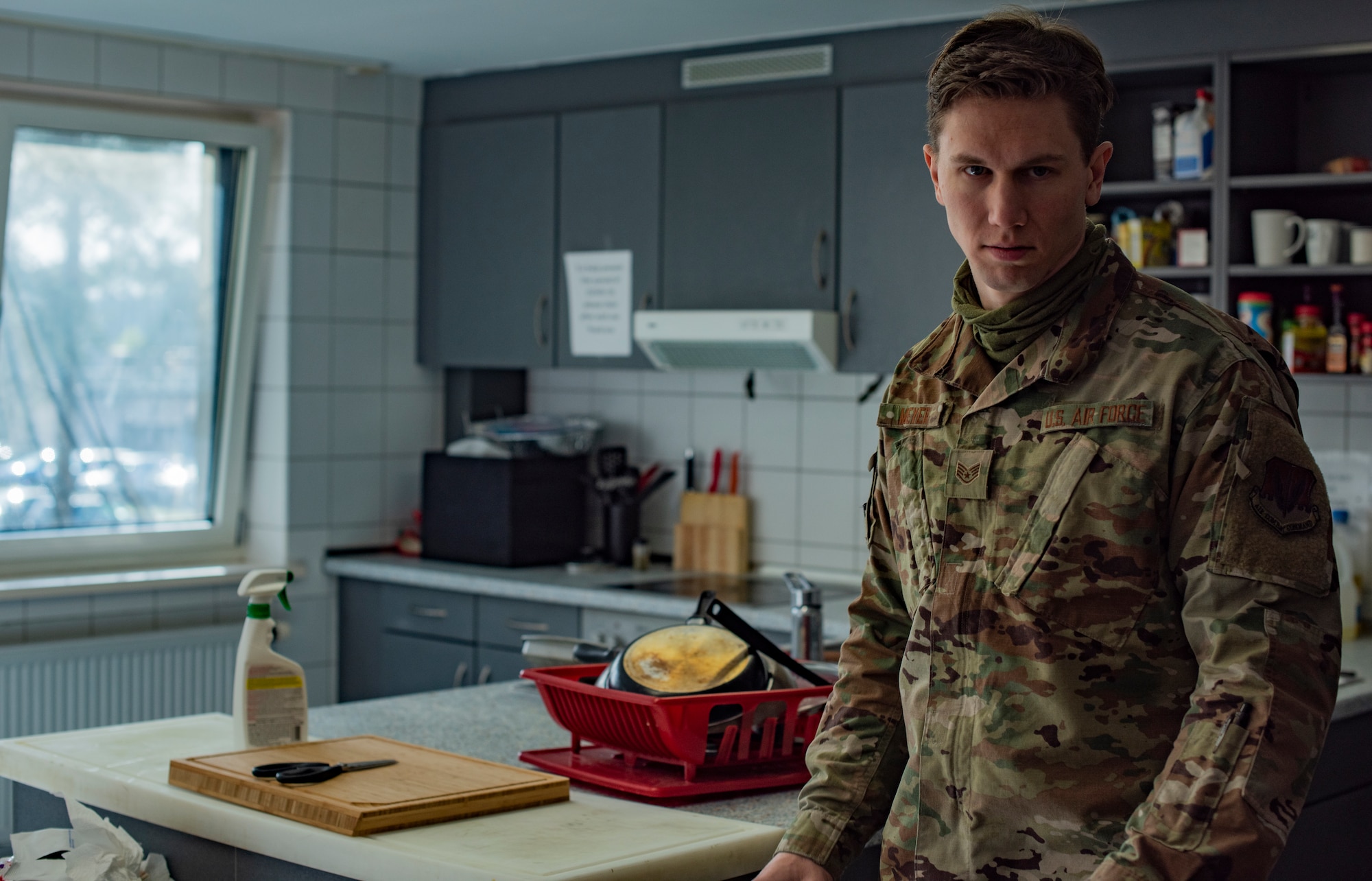 U.S. Air Force Staff. Sgt. Patrick Meyer, 86th Civil Engineer Squadron airman dorm leader, inspects a dorm kitchen at Ramstein Air Base, Germany, April 15, 2020.