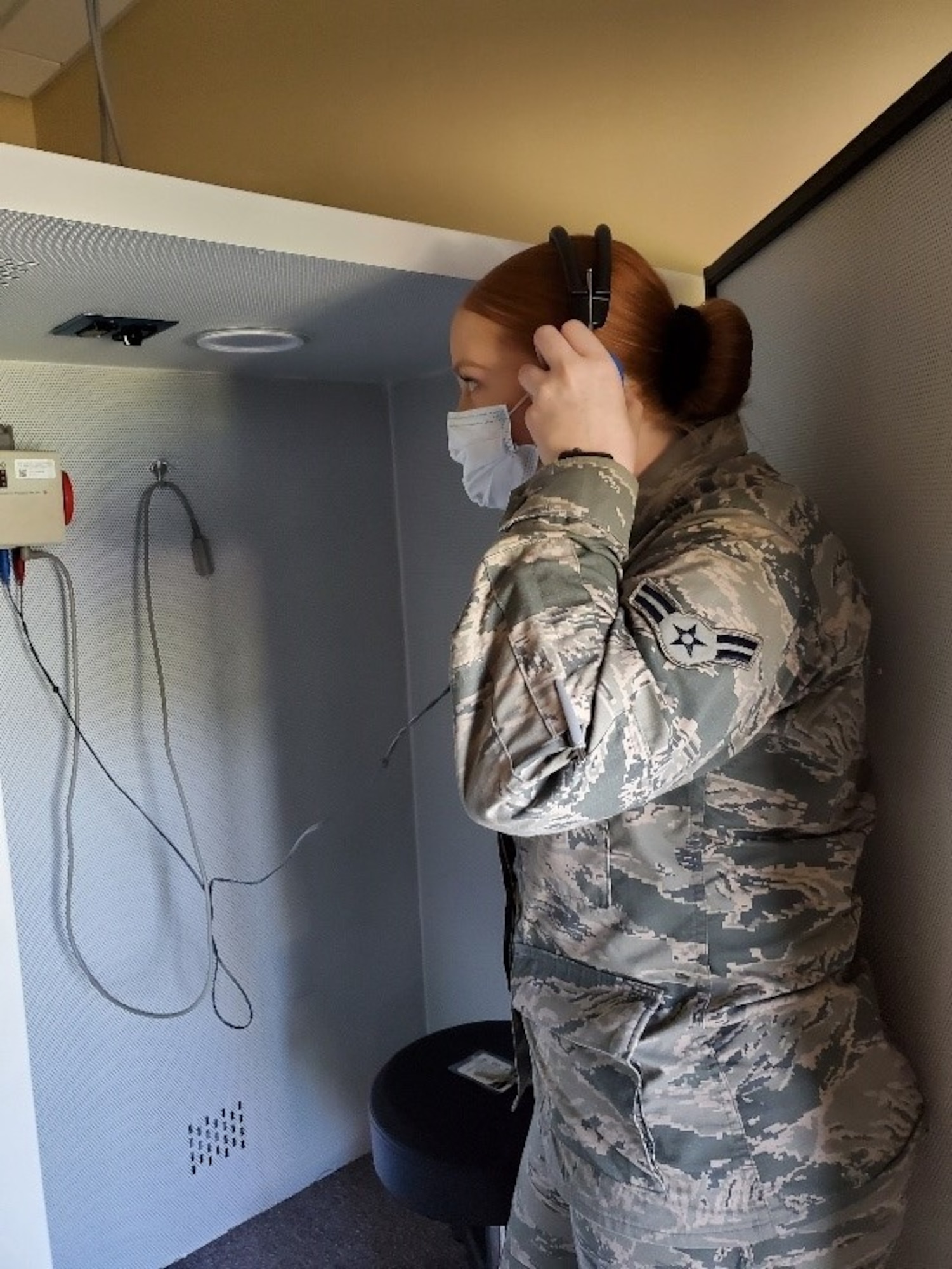 Airman 1st Class Sidney McDonough, a public health technician with the 6th Medical Group, ensures that hearing testing equipment is functioning properly before administering an audiogram. (U.S. Air Force photo)