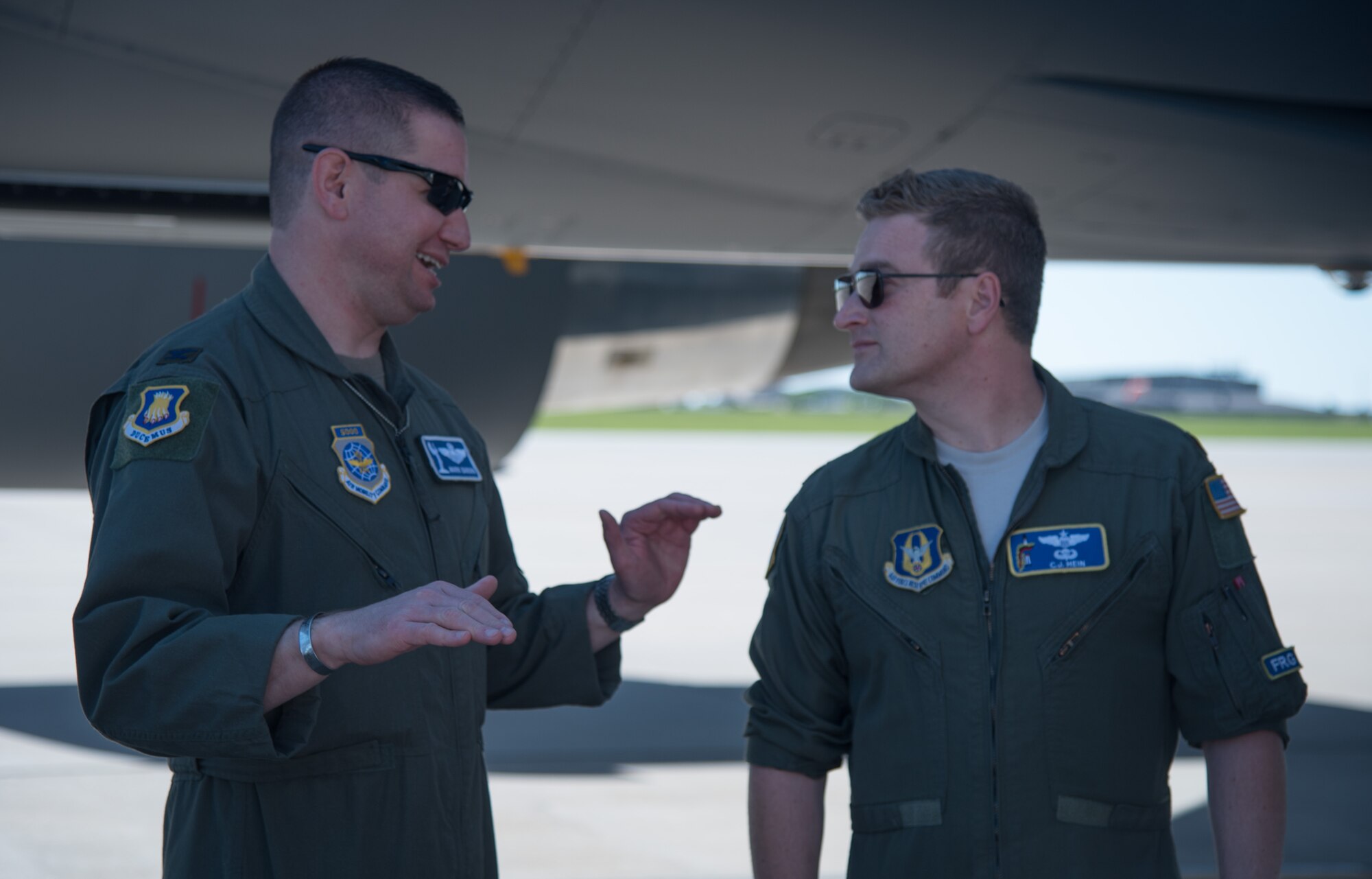 Col. Mark Baran, 22nd Air Refueling Wing vice commander, talks to Maj. Charles Hein, 18th Air Refueling Squadron KC-46 Pegasus pilot, before a flight, May 19, 2020 at McConnell Air Force Base, Kansas. Through Baran’s many career milestones he has honored Lt. Col. Fredric M. Mellory, Missing in Action Vietnam F-101 Voodoo pilot, by wearing a memorial bracelet. (U.S. Air Force photo by Senior Airman Michaela Slanchik)