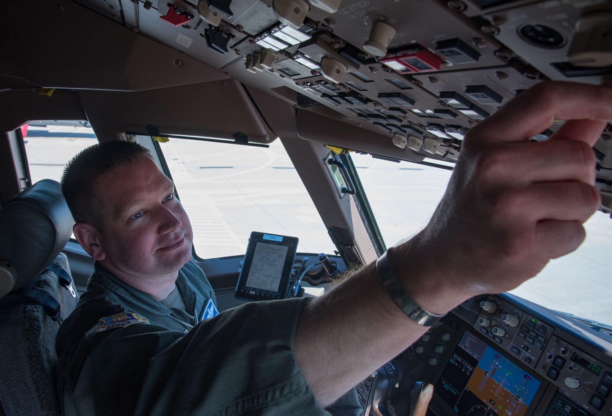 Col. Mark Baran, 22nd Air Refueling Wing vice commander, prepares for flight in a KC-46 Pegasus May 19, 2020, at McConnell Air Force Base, Kansas. Throughout Baran’s career, he has worn the memorial bracelet for luck. He honors Lt. Col. Fredric M. Mellor, prior Missing in Action Vietnam pilot, and plans to send the bracelet to Mellor’s family when he hangs up his flight suit. (U.S. Air Force photo by Senior Airman Michaela R. Slanchik)