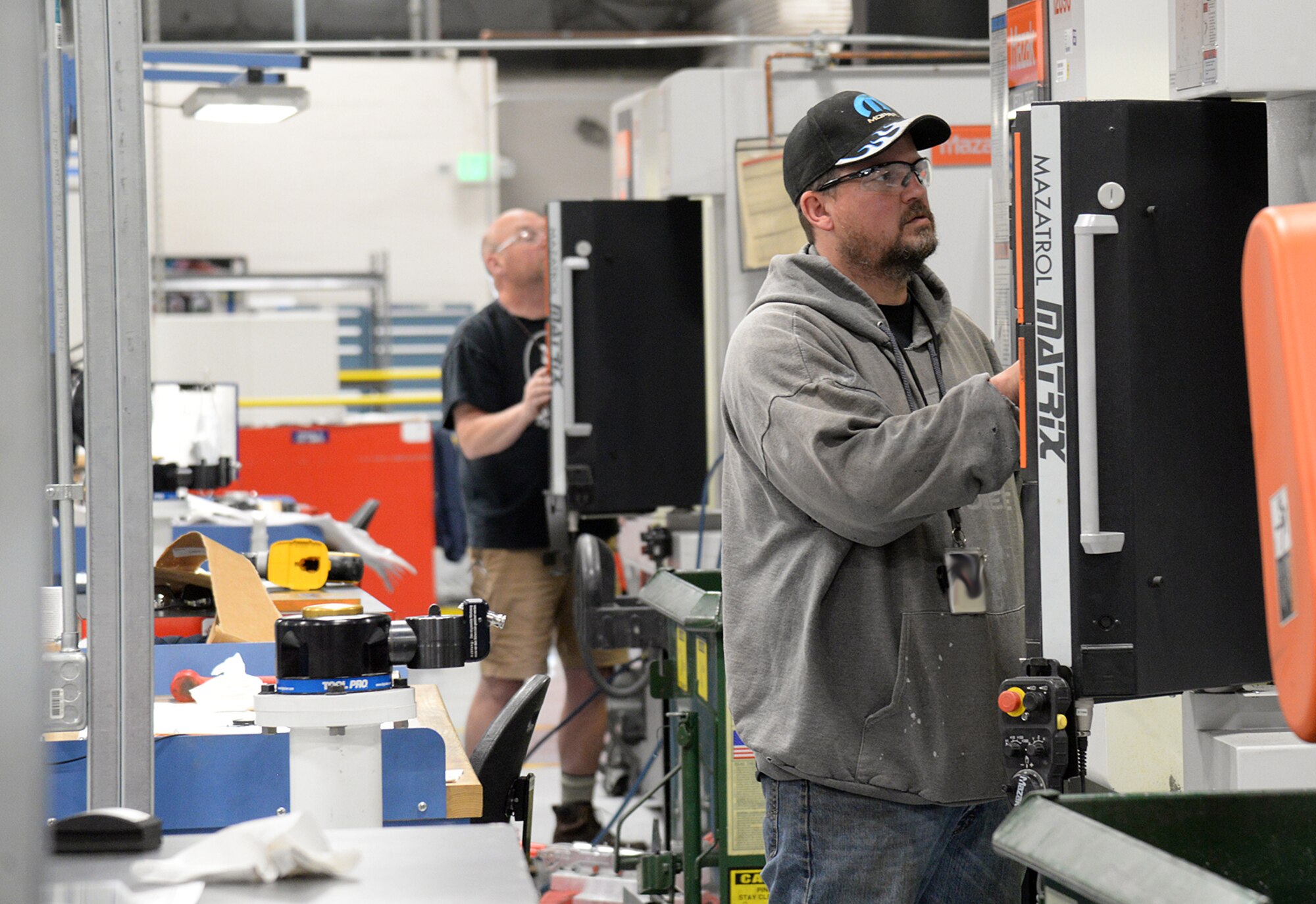 Troy Jolley, 533rd Commodities Maintenance Squadron, programs a Mazak machine May 5, 2020, at Hill Air Force Base, Utah. The skilled engineers and technicians of the 533rd CMMXS in the Ogden Air Logistics Complex, design, prototype and manufacture thousands of critical components annually, that can’t be found anywhere else in the world. The parts are manufactured in order to bridge a gap in the regular supply system, when there’s no contract in place from an outside source.